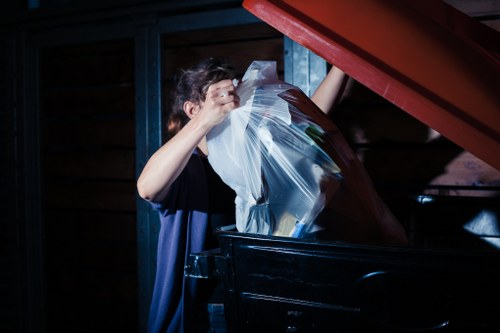 Homeowner sorting items during garage clearance